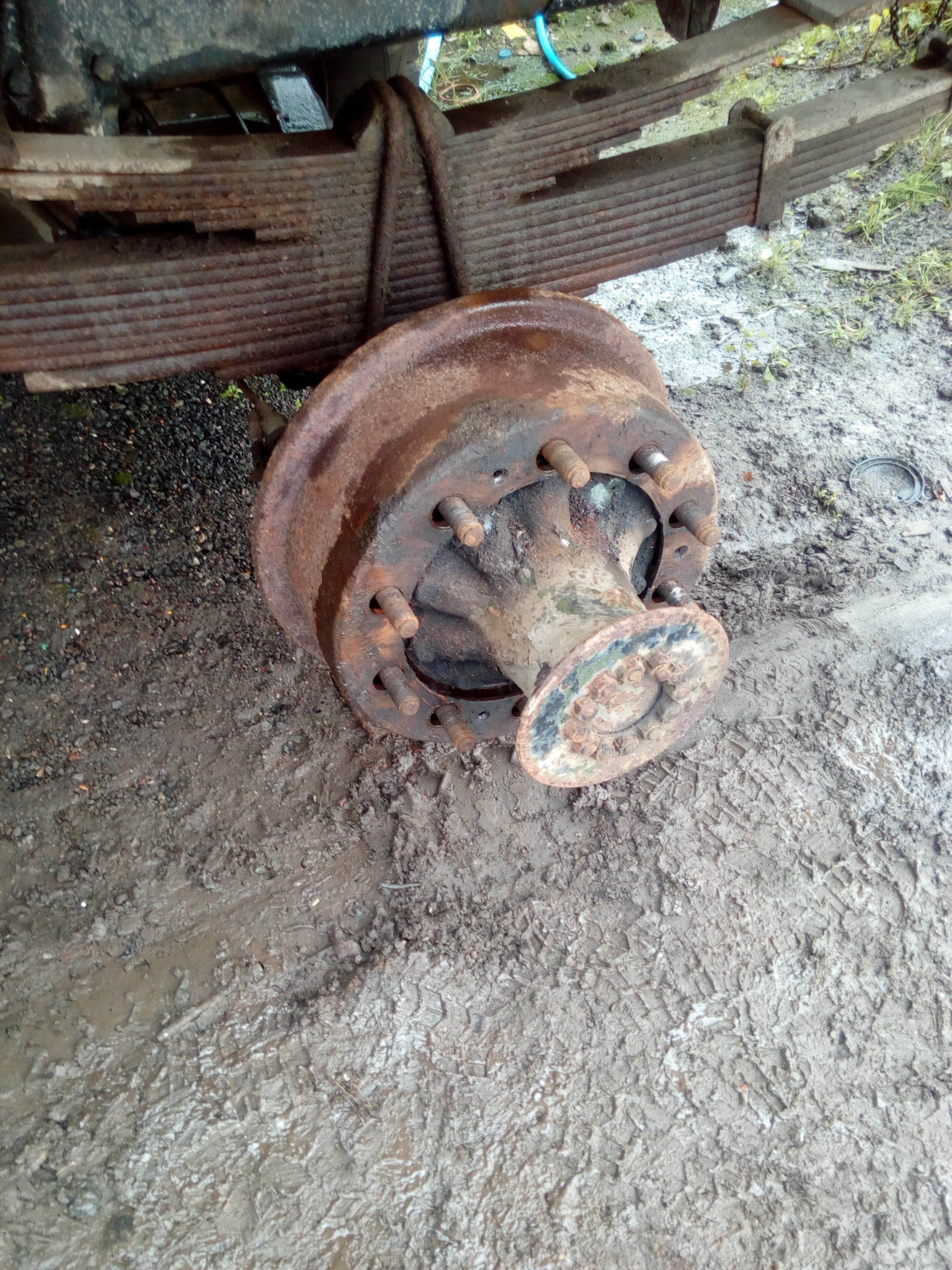 A photograph showing the back axle of the truck, with the brake
drum slid almost completely off