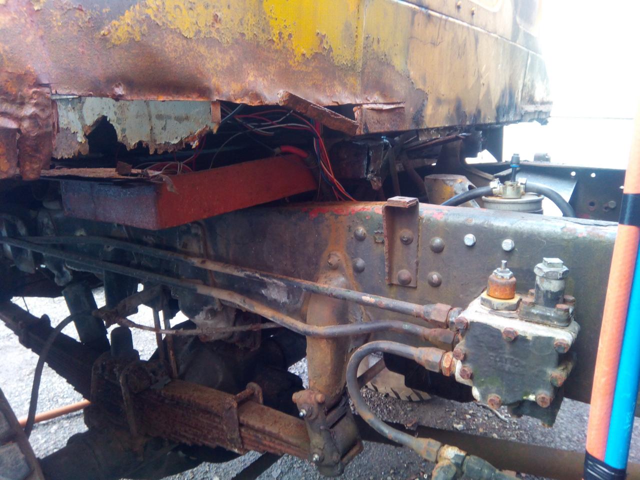 The rotten cab-back, now with the remains of the rear cab
crossmember cut out.