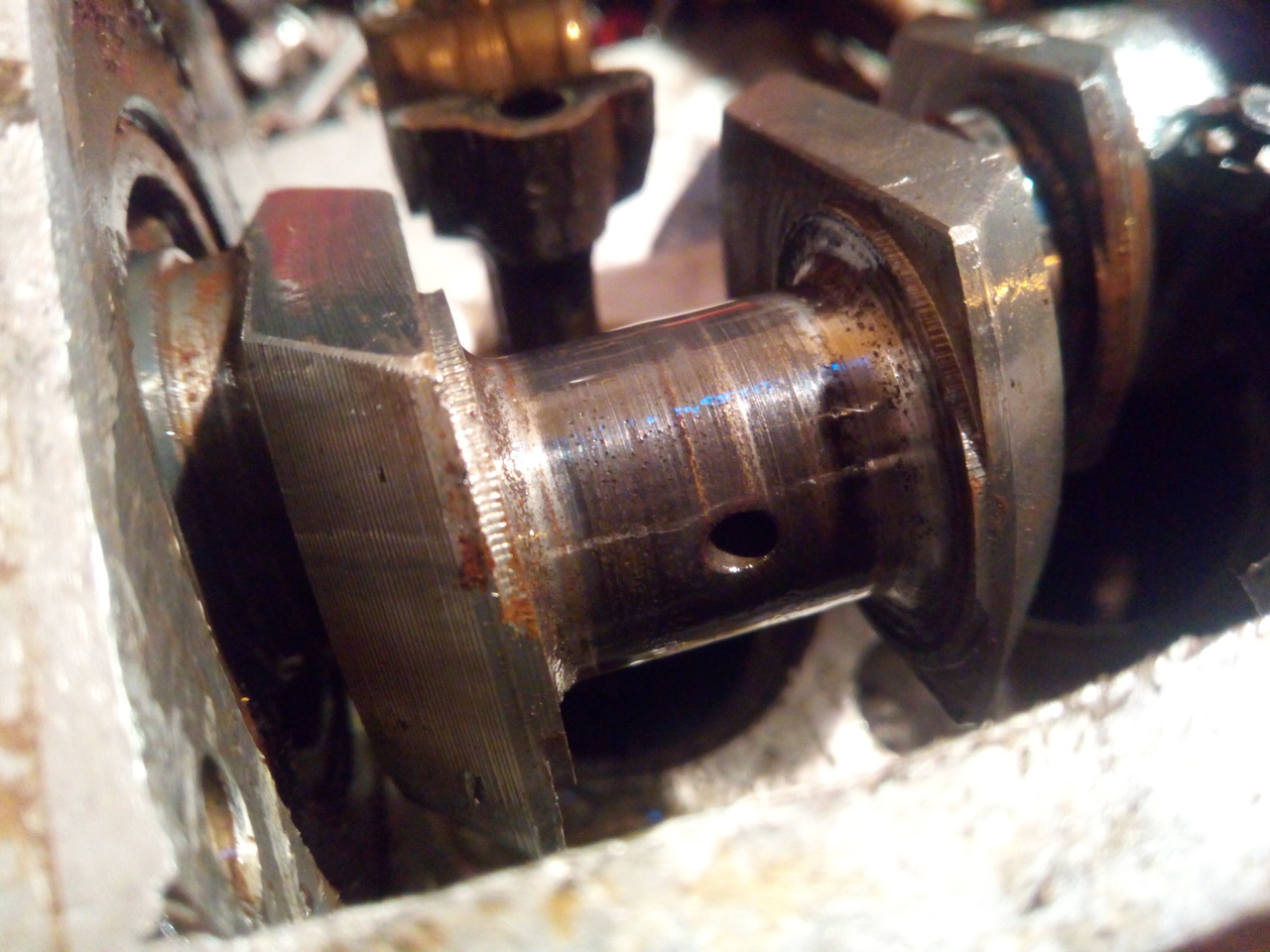 The surface of the crankshaft from the compressor. It's darkened
and looks to have scoring marks.