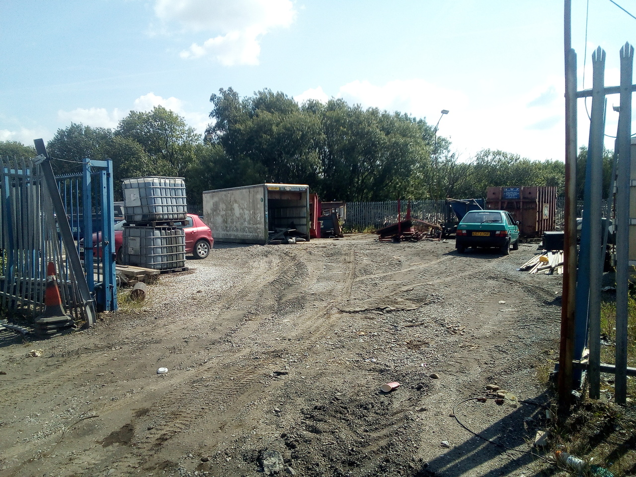 "Box-truck body pushed to one side, with a pair of tyre tracks leading from the empty space where the Bedford used to be"