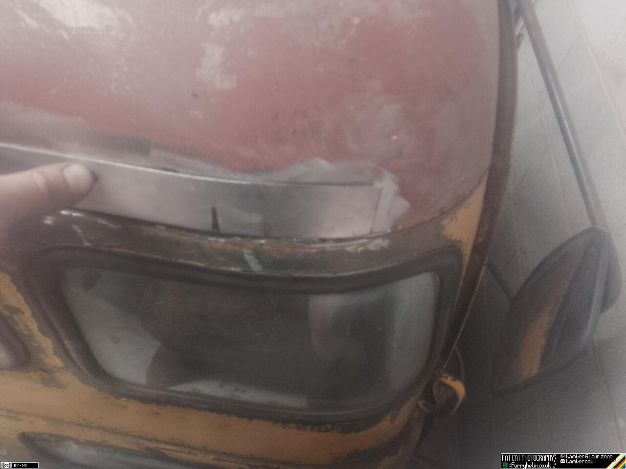 Corner of the cab, now with the long cut-out strip filled by a metal strip that is nearly bent to the right shape