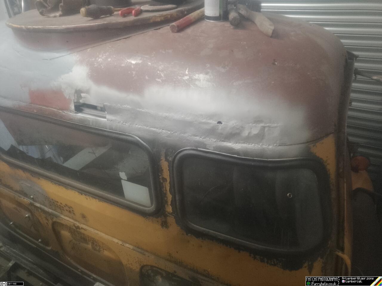 Back of the cab roof, with the fresh cut hole now mostly filled with welded in new metal.