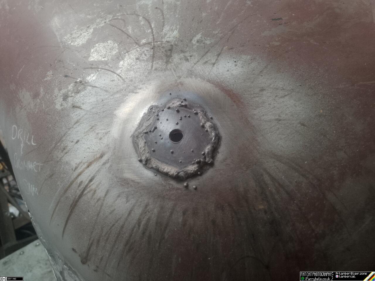 Close up on one of the bolt-holes from the previous picture, now with a heavy washer welded over it so that any load from bolting things on, is spread over greater area